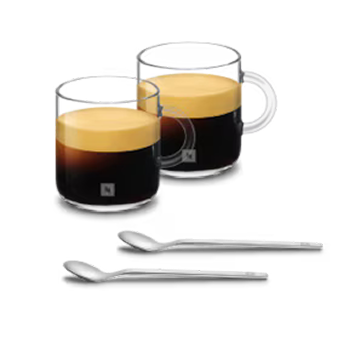 Two glass cups of Gran Lungo coffee with silver spoons